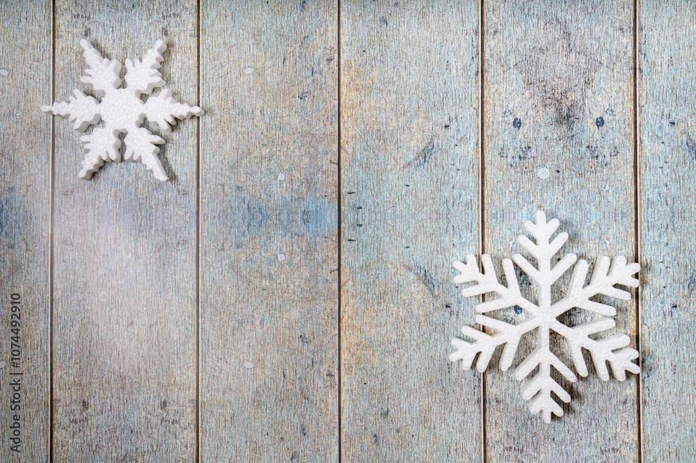 White decorative snowflakes on wooden background, copy space White decorative snowflakes on wooden background, copy space