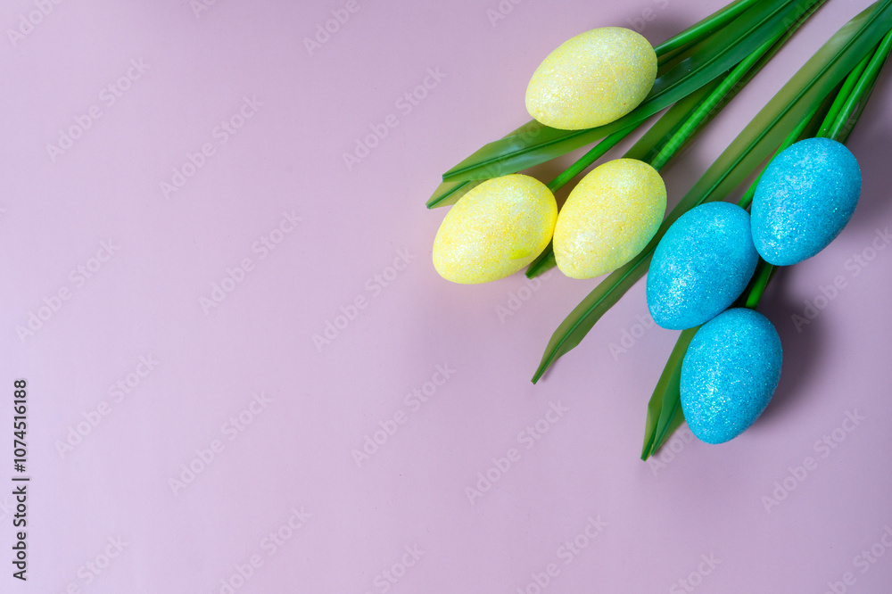 Flowers on purple background. Easter top view postcard with copy space Flowers on purple background. Easter top view postcard with copy space