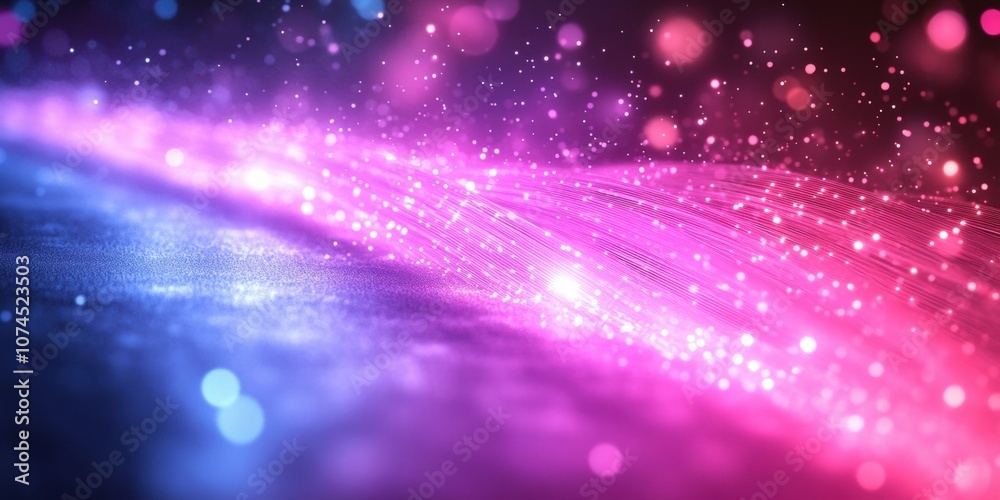 Obraz premium Abstract Background of Glowing Fiber Optics with a Beautiful Gradient of Pink, Blue, and Purple Hues Creating a Magical and Dreamy Atmosphere