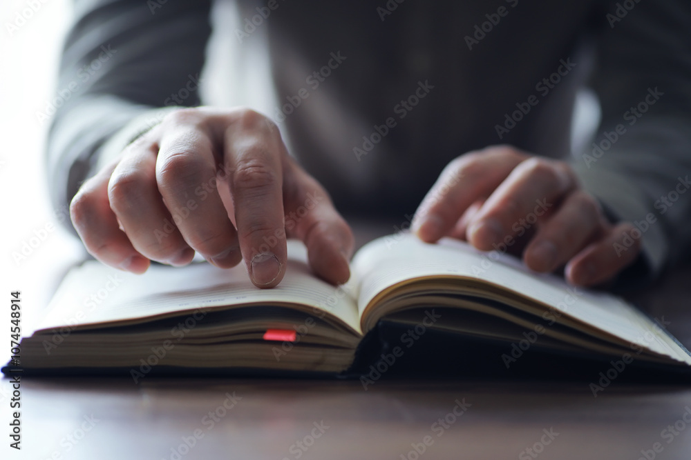 Read book. A man sits and reads literature. Textbooks to study. Religion. Read book. A man sits and reads literature. Textbooks to study. Religion.