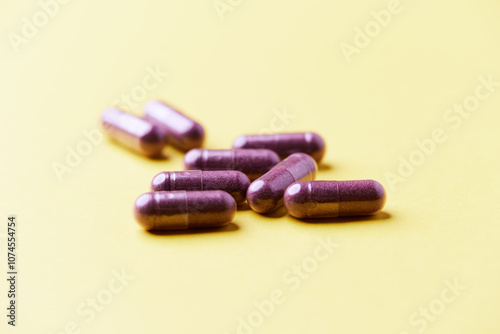 Lutein capsules. Dietary supplement on bright background. Soft focus. Close up. Copy space. photo