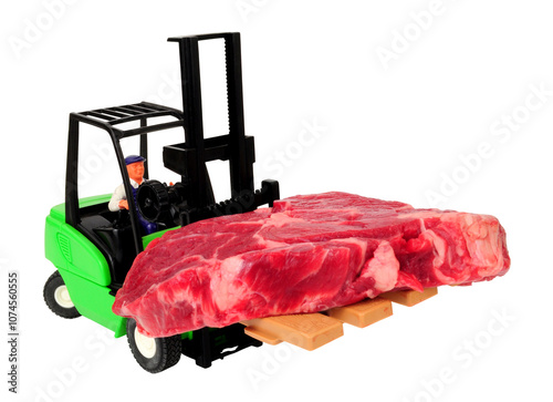 Toy forklift truck carrying a real fresh raw rib eye steak isolated on a white background