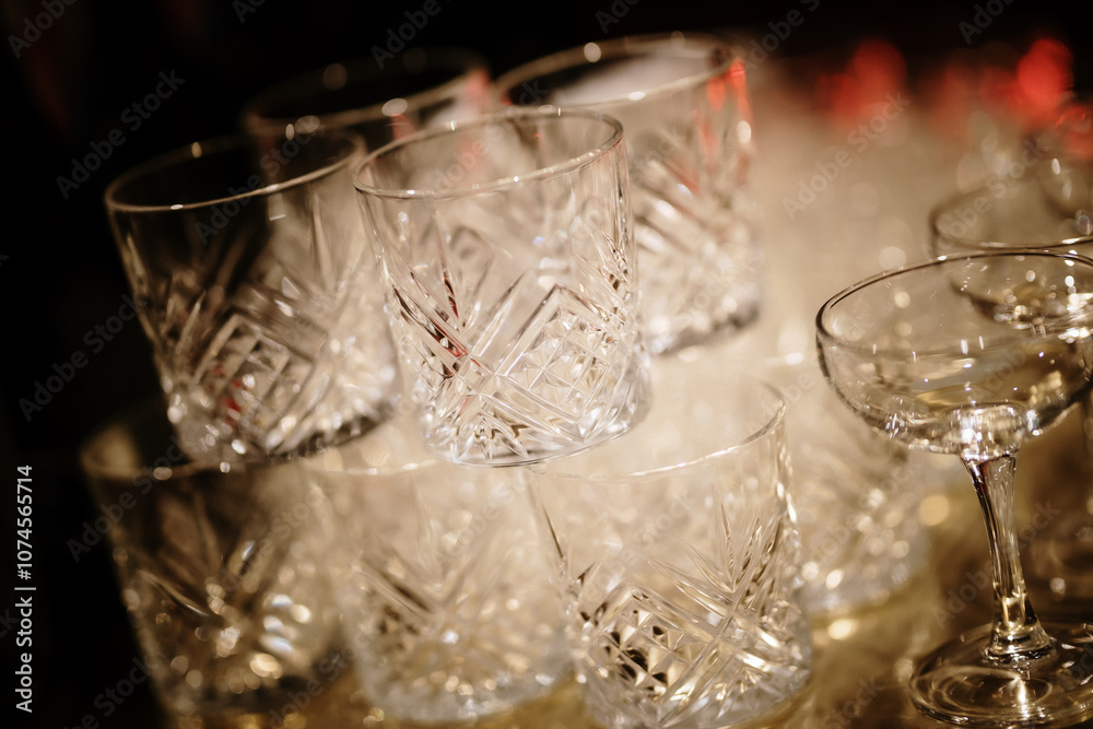 Elegant Crystal Glasses Stacked for Upscale Bar Service Elegant Crystal Glasses Stacked for Upscale Bar Service