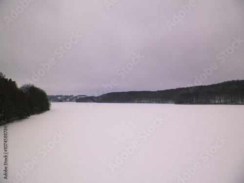 Frozen Ostrzyckie lake. Wiezyca, Kashubian region. Winter in northern Poland. photo