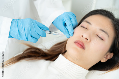 Cosmetic surgery, skin whitening injection, filler injection, Skin reface, beautiful Asian girls receive beauty treatments at beauty clinic, skincare, pore rejuvenation, wrinkle, baby face