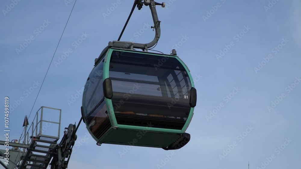 Cable car. Aerial rope transit, gondola lift. Tourism, cableway, sightseeing and public transportation concept Cable car. Aerial rope transit, gondola lift. Tourism, cableway, sightseeing and public transportation concept