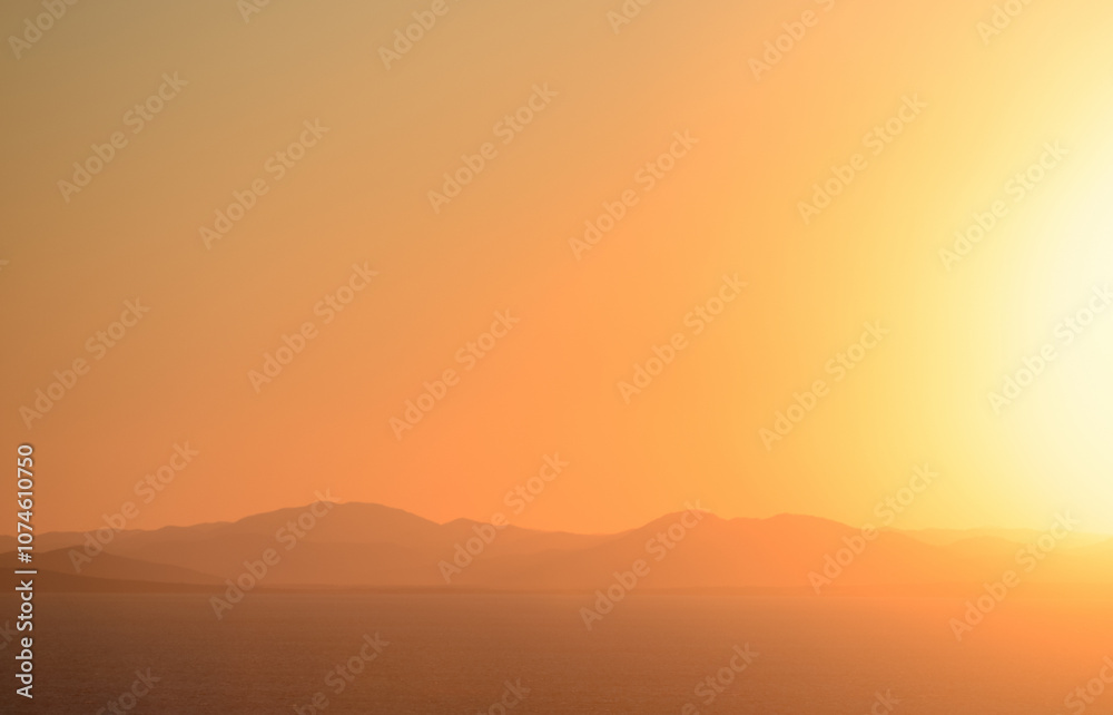 Seascape the background of the sunset sky.