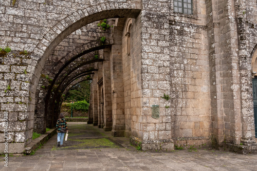 Ancient collegiate church Santa Maria de Sar in Santiago de Compostela with giant buttresses, subsequently built due to static problems