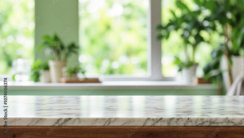 The empty white marble table top with blur background of green living room. For product display The empty white marble table top with blur background of green living room. For product display