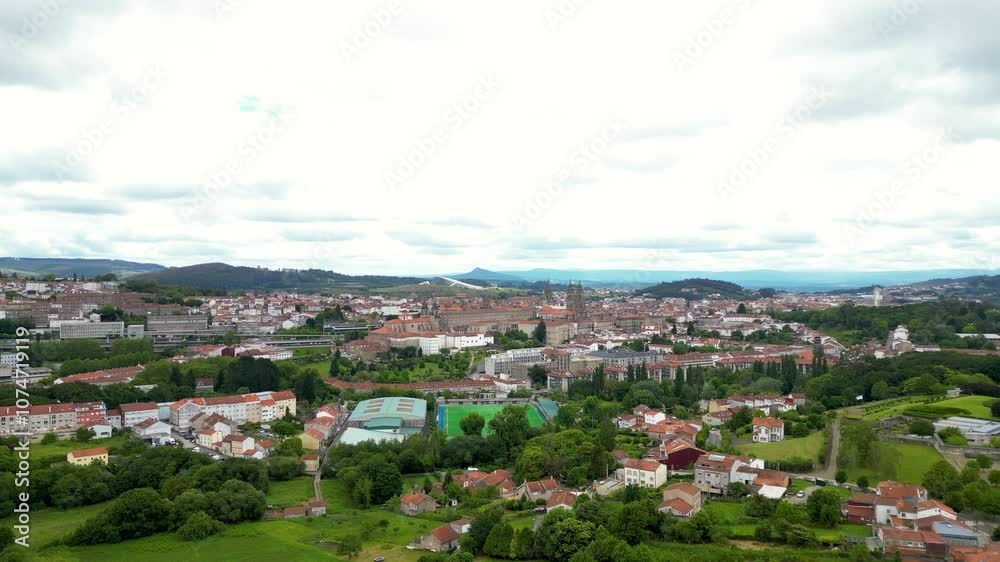 Panoramic aerial view of Santiago de Compostela city. Cathedral of Santiago in the middle. The cathedral is the reputed burial place of Saint James the Great, one of the apostles of Jesus Christ. Panoramic aerial view of Santiago de Compostela city. Cathedral of Santiago in the middle. The cathedral is the reputed burial place of Saint James the Great, one of the apostles of Jesus Christ.