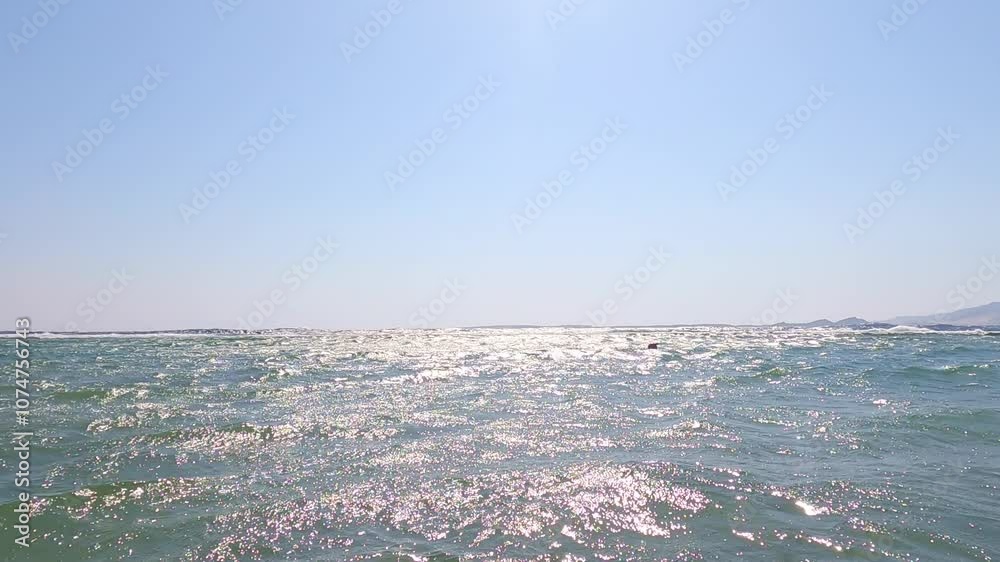 the surface of the sea with ripples and waves. the surface of the sea with ripples and waves.