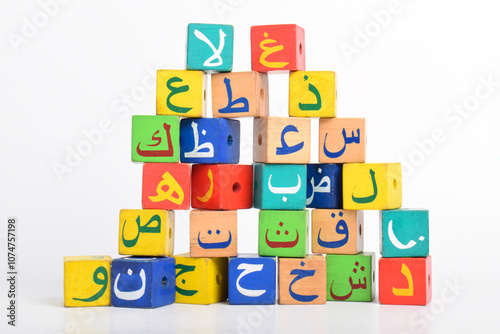 Fotografie Wooden Arabic Alphabet Blocks isolated on white background
