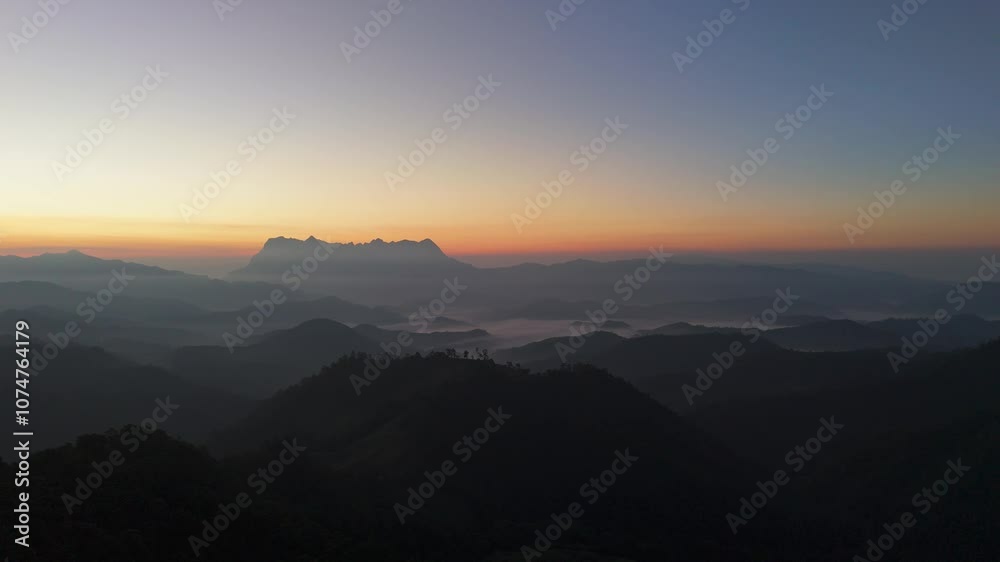 mountain peaks in morning fog - foggy morning over thailand mountains mountain peaks in morning fog - foggy morning over thailand mountains