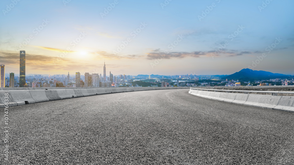 Scenic Sunset Over Urban Skyline: A Majestic Road View