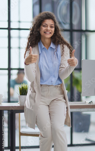 Proud office worker posing with thumbs up Free Download Proud office worker posing with thumbs up - GFXLoad