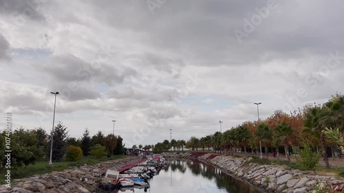 Tree-lined canal in the city in autumn. photo