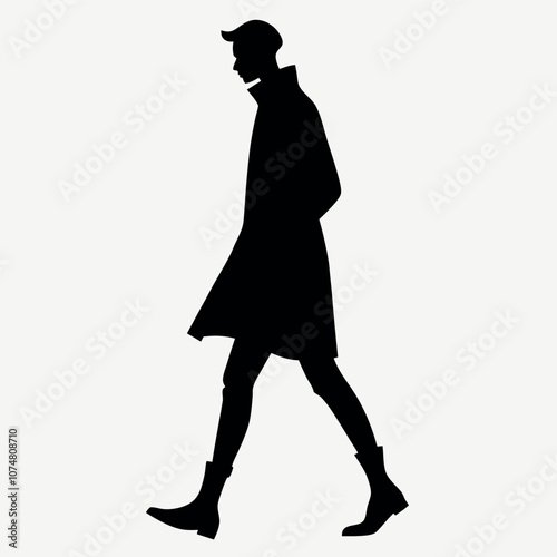 a silhouette of a person walking in a stylish trench coat and boots