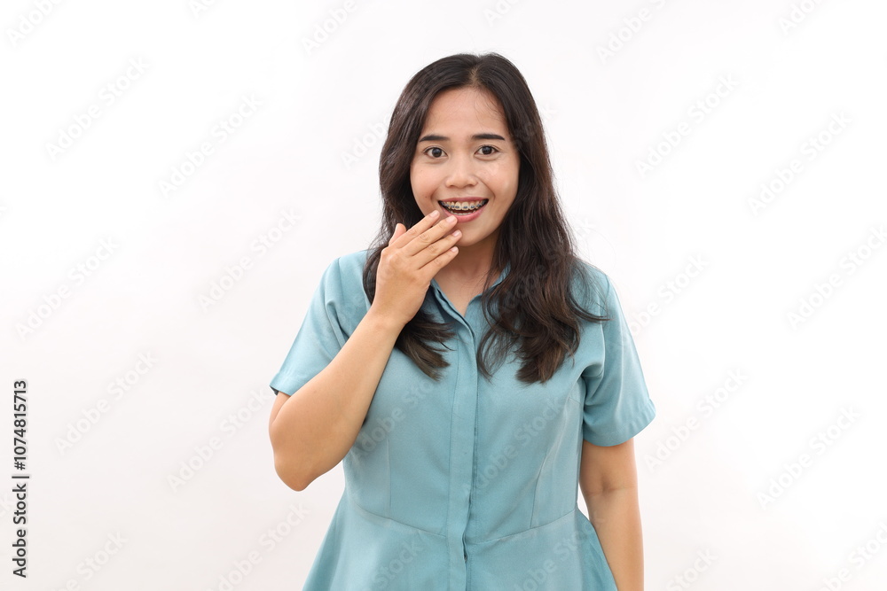 Impressed beautiful woman looks with great wonder keeps eyes dressed casual shirt in against white background. Human face expressions and emotions concept. Extremely surprised female Impressed beautiful woman looks with great wonder keeps eyes dressed casual shirt in against white background. Human face expressions and emotions concept. Extremely surprised female