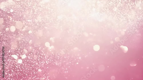 A soft pink background filled with shimmering light and delicate bokeh effects.