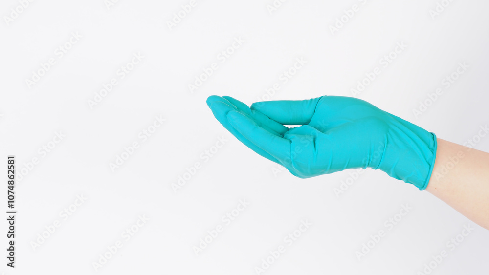 Empty ands wear aqua mint green latex gloves on white background. Empty ands wear aqua mint green latex gloves on white background.