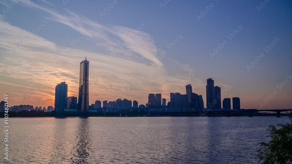 4K timelapse of 63 Building and high rise buildings of financial district with Wonhyo Bridge on Han River at Yeouido near Yeongdeungpo-gu, Seoul, South Korea 4K timelapse of 63 Building and high rise buildings of financial district with Wonhyo Bridge on Han River at Yeouido near Yeongdeungpo-gu, Seoul, South Korea