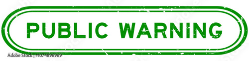 Grunge green public warning word rubber seal stamp on white background