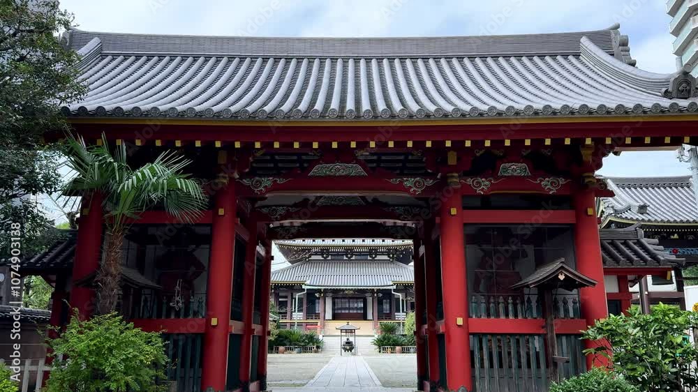 Ancient Japanese temple with red gates and traditional architecture in a serene courtyard setting Ancient Japanese temple with red gates and traditional architecture in a serene courtyard setting
