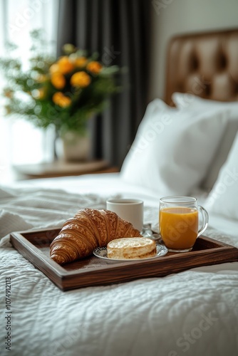 Obraz na płótnie A cozy morning in a hotel with a tray of breakfast treats on a fuzzy bed background w salonie