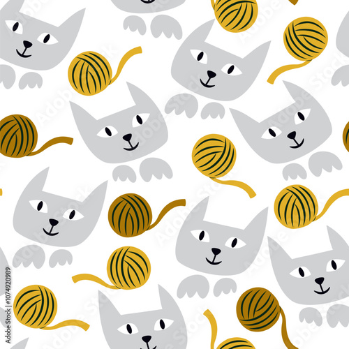 Vector seamless pattern with cats and balls of wool