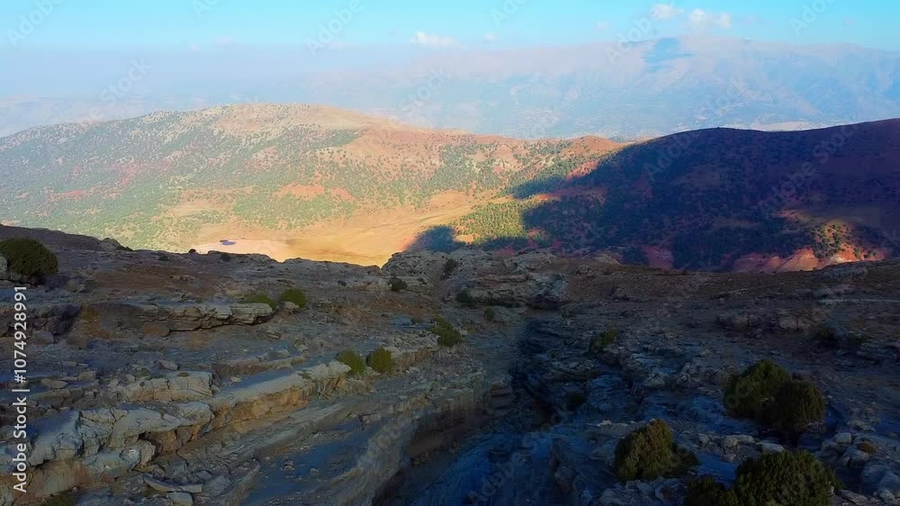 Aerial view of Boysun mountains at dawn. Rocky mountains of Surkhandarya region, Uzbekistan. Travel, mountains, trekking tour Aerial view of Boysun mountains at dawn. Rocky mountains of Surkhandarya region, Uzbekistan. Travel, mountains, trekking tour