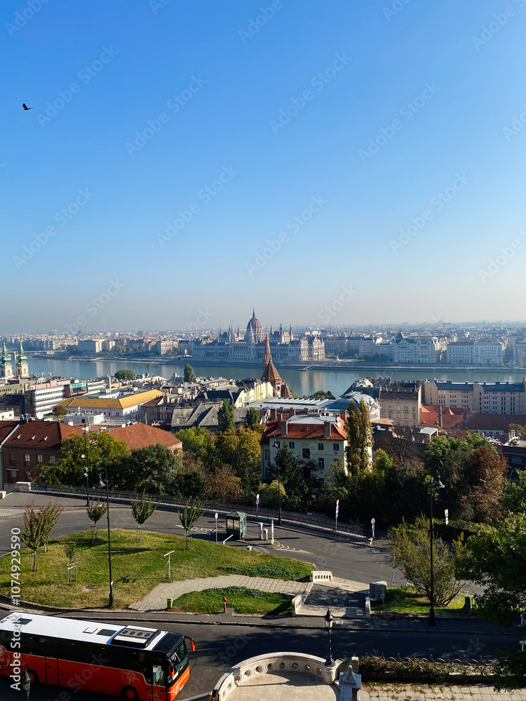 Obraz premium Scenic view of Budapest skyline with river and parliament building