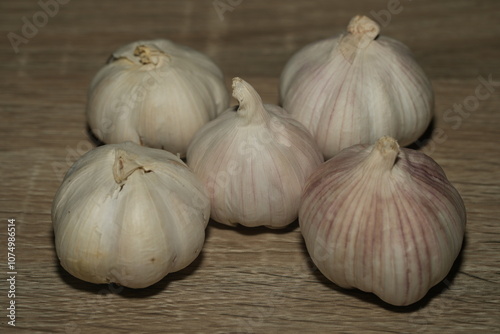 Garlic (Allium sativum) is a widely used culinary ingredient and medicinal herb that belongs to the onion family. Known for its pungent aroma and bold flavor, garlic adds depth and warmth to a variety