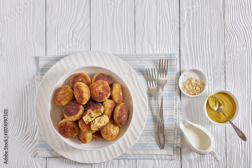 Northern Pike fish cakes in a white bowl photo