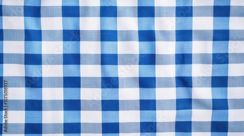 Blue and White Gingham Pattern Fabric Texture with Soft Light Ideal for Tablecloths, Fashion, Craft Projects, and Backgrounds in Various Designs