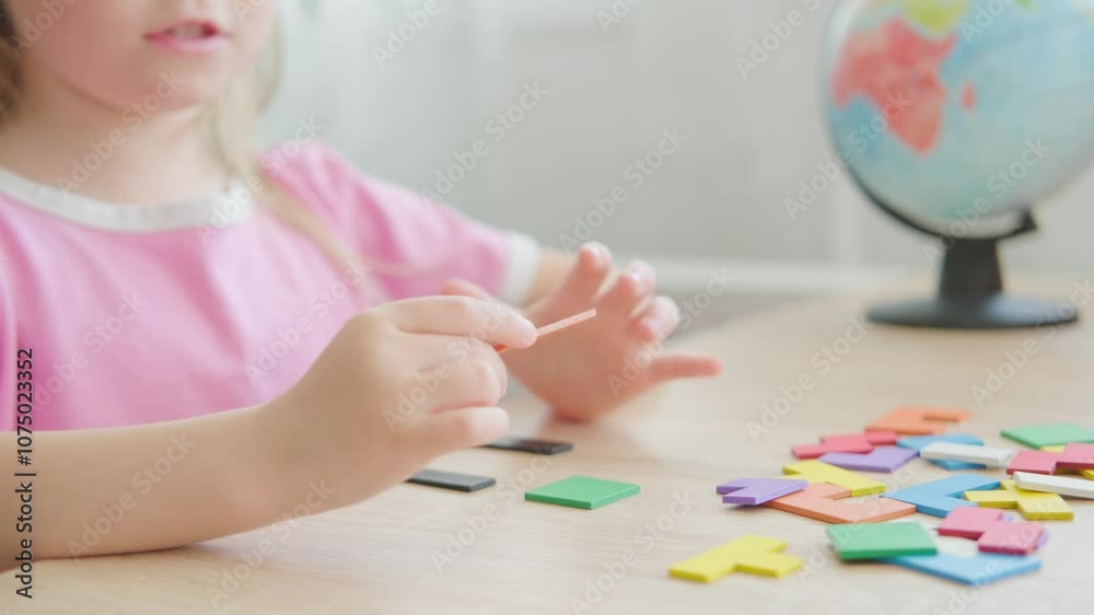 little 5 year old girl playing at home with wooden blocks, child's hand explore intricate world colorful wooden puzzle, nurturing creativity, imagination and problem-solving skills little 5 year old girl playing at home with wooden blocks, child's hand explore intricate world colorful wooden puzzle, nurturing creativity, imagination and problem-solving skills
