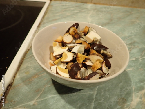 preparation of a mushroom soup in kitchen photo