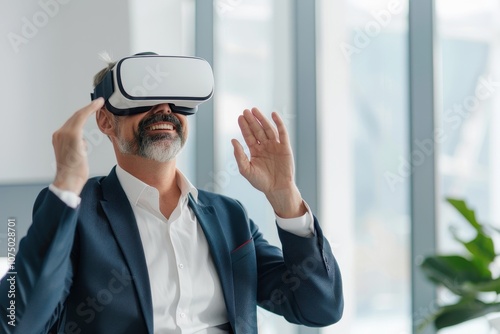 A smiling businessman wearing a VR headset, engaging with virtual reality in a modern office, representing innovation, technology, and immersive experiences.