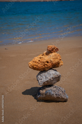 Wall Mural balancing stones on the sea