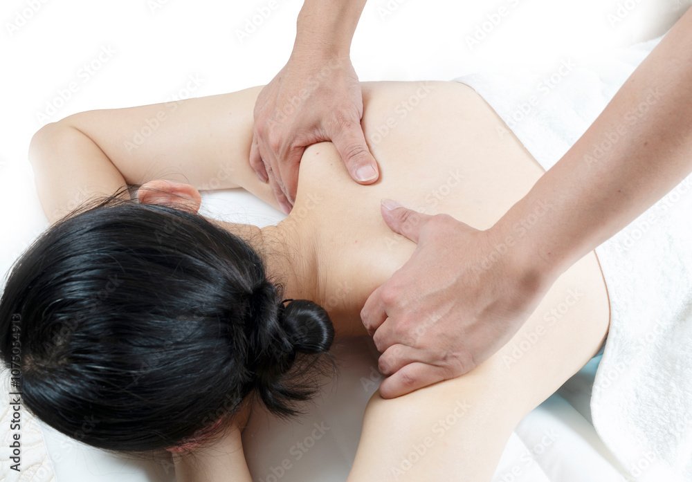 The doctor is massaging the body of a woman