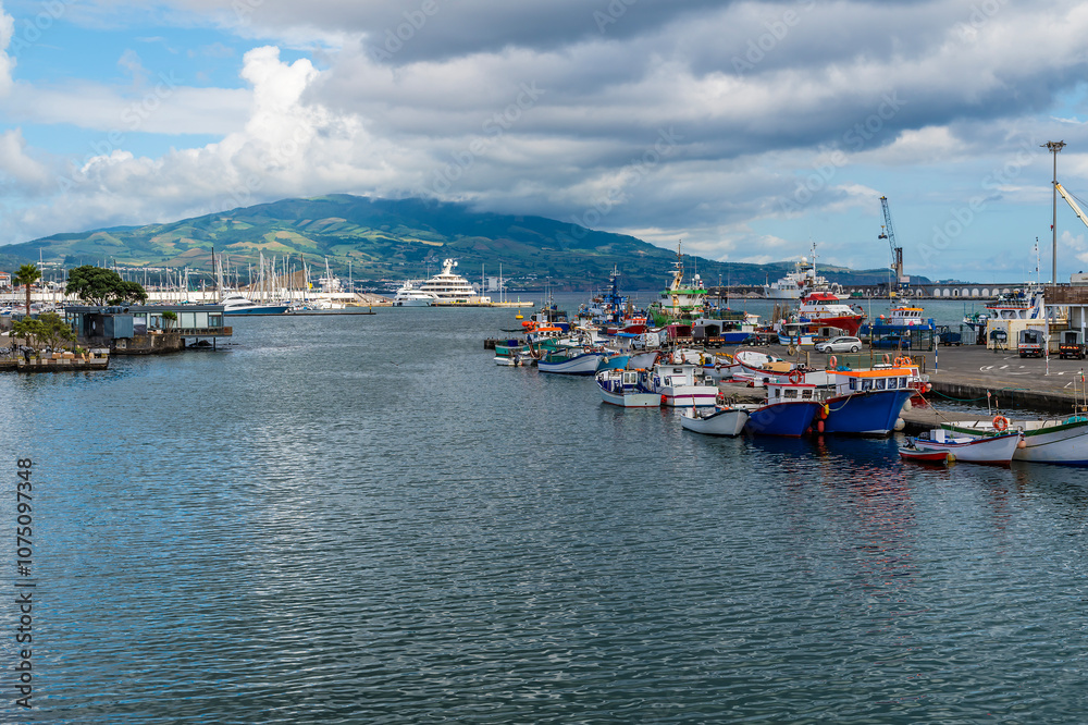 A view from the medieval fort across the harbor in Ponta Delgada on the island of Sao Miguel in the Azores in summertime A view from the medieval fort across the harbor in Ponta Delgada on the island of Sao Miguel in the Azores in summertime