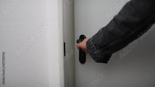 Hand Is Opening Fire Rated Door photo