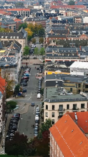 Aerial drone view of Vesterbro district in Copenhagen, Denmark in daylight. Vertical photo