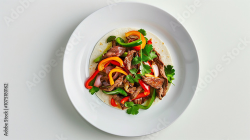Beef Fajitas with Bell Peppers and Onions on Flour Tortilla