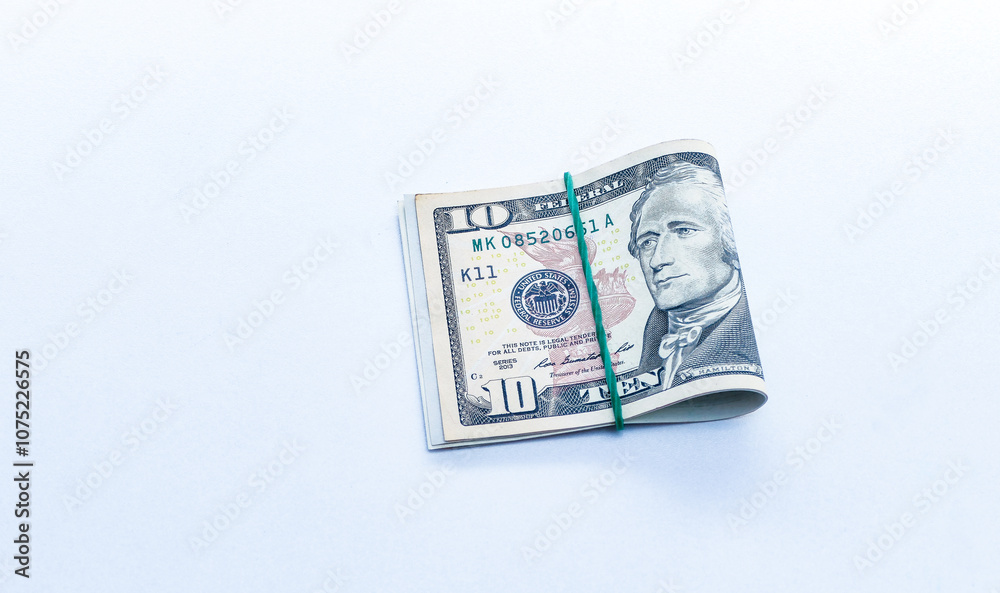 american money along with magnet, dice and compass. profit and loss. careful calculation american money along with magnet, dice and compass. profit and loss. careful calculation