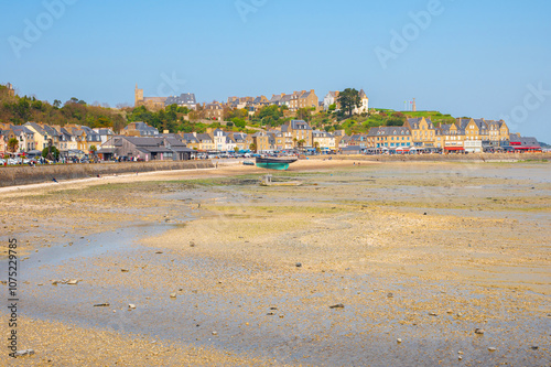 Beautiful cityscape at low tide with fishing boats of the town Cancale, Brittany, France.