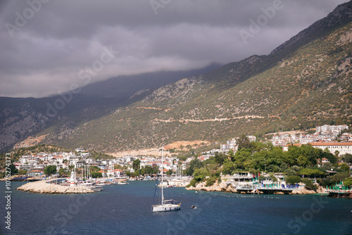 view of the city by the sea and mountains. Residential buildings and hotels near the sea beach