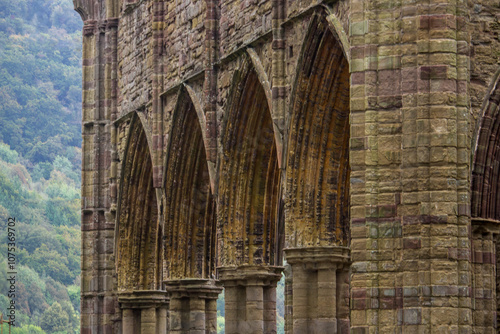 The walls of the ruins of the abbey church of Tintern abbey in Wales photo