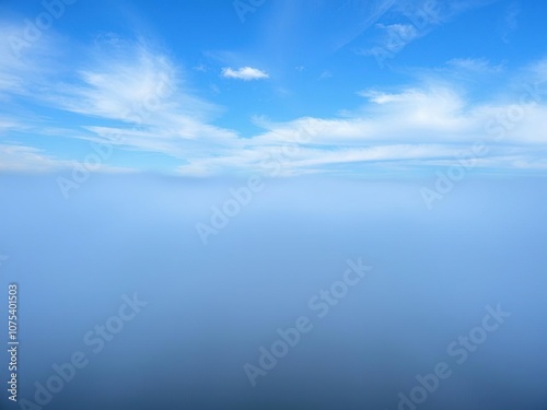 Wallpaper Mural A beautiful bright blue misty morning sky with wavy clouds that resemble elegant ripples on a pond, wavy clouds, cloud formations, atmospheric effects Torontodigital.ca
