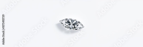 A single diamond of marquise cut on a white background with slight shading and reflections, showcasing its unique shape and brilliance, elegant design, high end, elegance