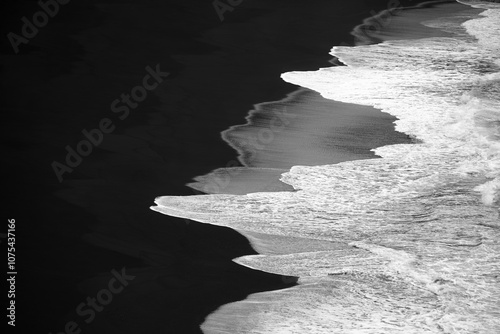 Black-and-White Ocean Waves on Black Sand Volcanic Beach - Minimal Graphic Texture